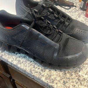 Reebok black zigzag size 14 only worn twice. Nice pair of shoes